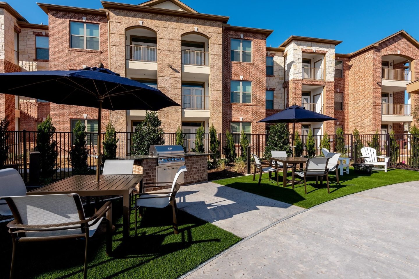 Grill and chill BBQ and fire pit entertaining space at Windsor Castle Hills, Carrollton, 75010