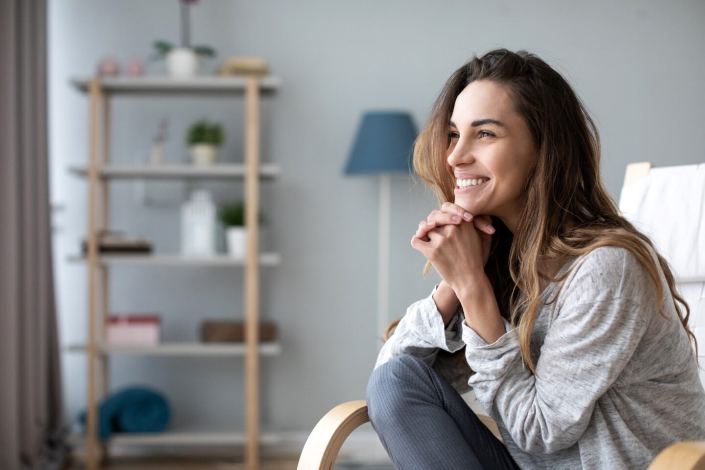woman smiling in apartment