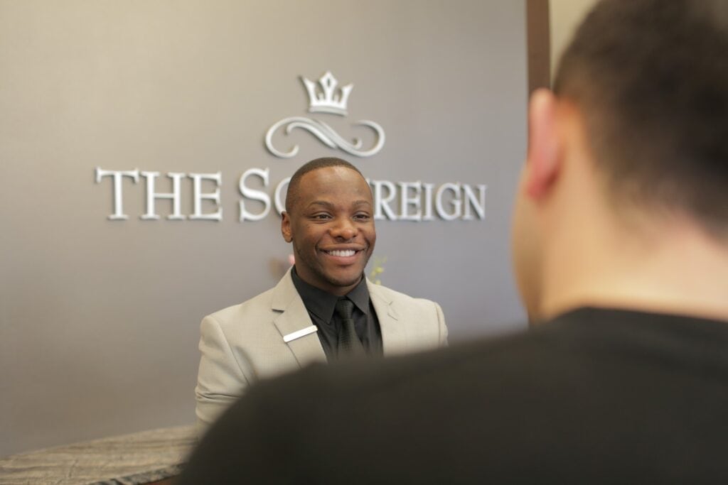 concierge greeting man at The Sovereign apartments