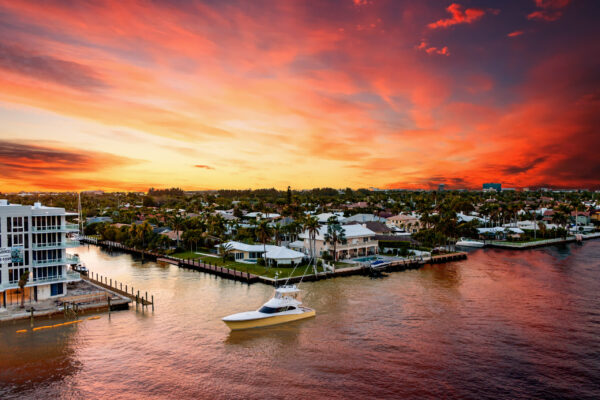 A boat cruising up the Intracoastal Waterway in Fort Lauderdale, Florida